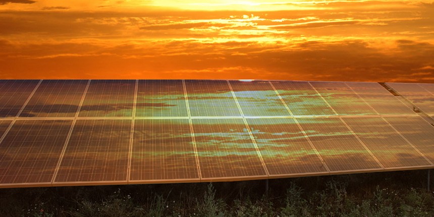 Sunset over solar power station